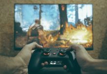 A New Multi-Tier Anti-Cheat Approach in Online First Person Shooter (FPS) Games