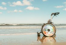 Theoretical and Simulated Design of an Autonomous Beach-Cleaning Robot